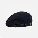 Black beret with a belt on a white background, featuring 'Obroi' branding.