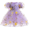Lavender dress with yellow floral patterns on a white background, Obroi