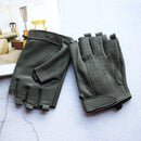 Pair of green driving gloves on a textured surface with a blurred indoor background, Obroi