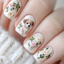 Nails with dog and floral design on a textured surface, Obroi