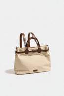 Beige handbag with brown straps on a light gray background, Obroi