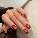 Hand with red nail polish on a neutral background, Obroi