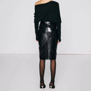 Person wearing a black off-shoulder top and black leather skirt on a light gray background ,Obroi