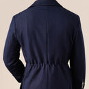 Navy blue coat on a beige background, Obroi