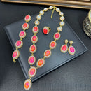 Jewelry set with necklace, earrings, and ring on a dark surface, Obroi