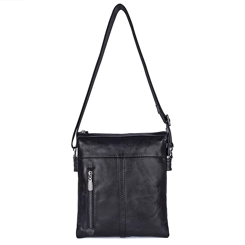 Obroi Black leather crossbody bag on a white background