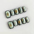 Decorative nails with celestial designs on a light gray background, Obroi
