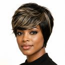 A woman with a short, layered pixie wig featuring dark brown and blonde highlights, shown in a close-up portrait against a light beige background, Obroi