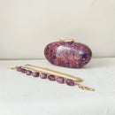 Purple and gold handbag with a matching chain on a white background, Obroi