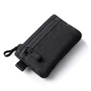 Black zippered pouch with RFID protection feature on a white background, Obroi