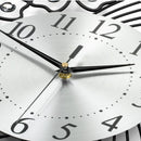 Close-up of a clock face with black hands and numbers on a white background, Obroi
