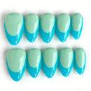 Set of teal and light blue gradient nail tips on a white background, Obroi