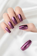 Hand with purple metallic nail polish on a white background, Obroi