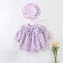 Lavender baby dress with bow and matching hat on a light background, Obroi
