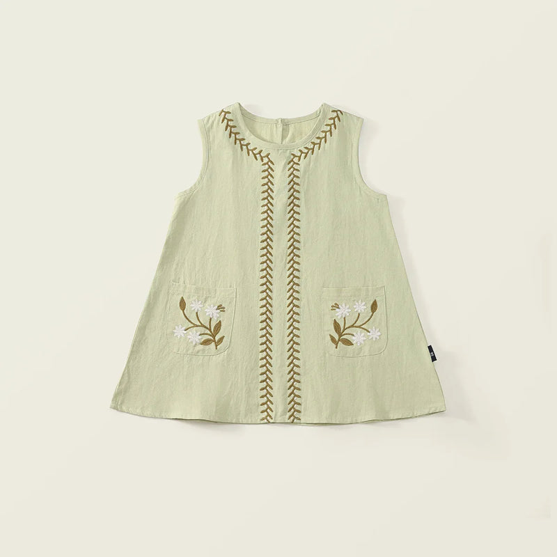 Light green sleeveless dress with floral embroidery on a beige background
