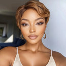 Woman with styled hair and makeup in a neutral setting, Obroi