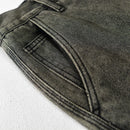 Close-up of dark gray jeans on a white background, Obroi
