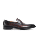 Black leather loafer with brown pattern on a white background, Obroi