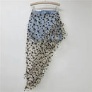 Skirt with butterfly pattern on a hanger against a white background, Obroi