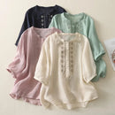 Four embroidered shirts in different colors on a light background, Obroi