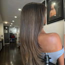 Person with long, straight hair in a salon setting ,Obroi