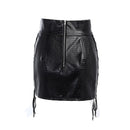 Black leather skirt with zipper and tie details on a white background, Obroi