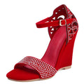 Red wedge sandal with rhinestone details on a white background, Obroi