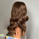 Brown wavy hair extension on a neutral background, Obroi
