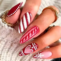 Nails with red and white designs on a textured surface, Obroi