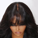 Black wig with bangs on a mannequin head, featuring the obroi brand, Obroi