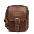 Brown leather crossbody bag with a buckle on a white background, Obroi