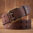 Brown leather belt with gold buckle on a wooden surface, Obroi
