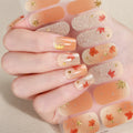 Nail art with autumn leaves and gold stars on a neutral background, Obroi