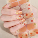 Nail art with autumn leaves and gold stars on a neutral background, Obroi