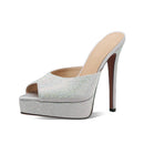 Silver high-heeled shoe with platform on a white background, Obroi
