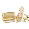 Gold handbag and high-heeled shoes on a white background, Obroi