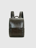 Dark brown leather backpack with cowhide leather detail on a light gray background, featuring the brand 'Obroi'.