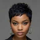 Woman with short black hair wearing hoop earrings against a gray background, Obroi
