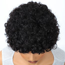 Black curly wig on a mannequin head against a white background, Obroi