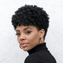 Woman with stylish black hair wearing a black turtleneck against a light background, Obroi