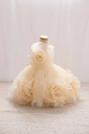 Cream-colored dress with floral design on a mannequin against a light background, Obroi