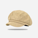 Beige cap on a light gray background with 'Obroi' branding.