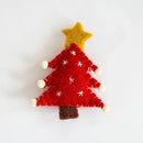 Felt Christmas tree ornament with a star on a white , Obroi