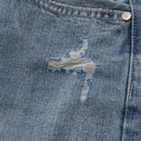 Close-up of a blue denim fabric with a distressed design, Obroi