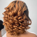 Close-up of a person with styled hair on a plain background, Obroi