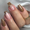 Close-up of a hand with brown and pink nail polish on a neutral background, Obroi
