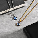 Two necklaces with evil eye pendants on a textured surface, Obroi