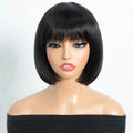 A black bob wig with straight bangs displayed on a mannequin head and shoulders against a plain light background, Obroi