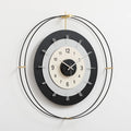Modern wall clock with black and white design on a light gray background, Obroi