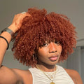 Woman with curly red hair posing outdoors, Obroi